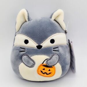 Squishmallow Floxie the fox holding pumpkin